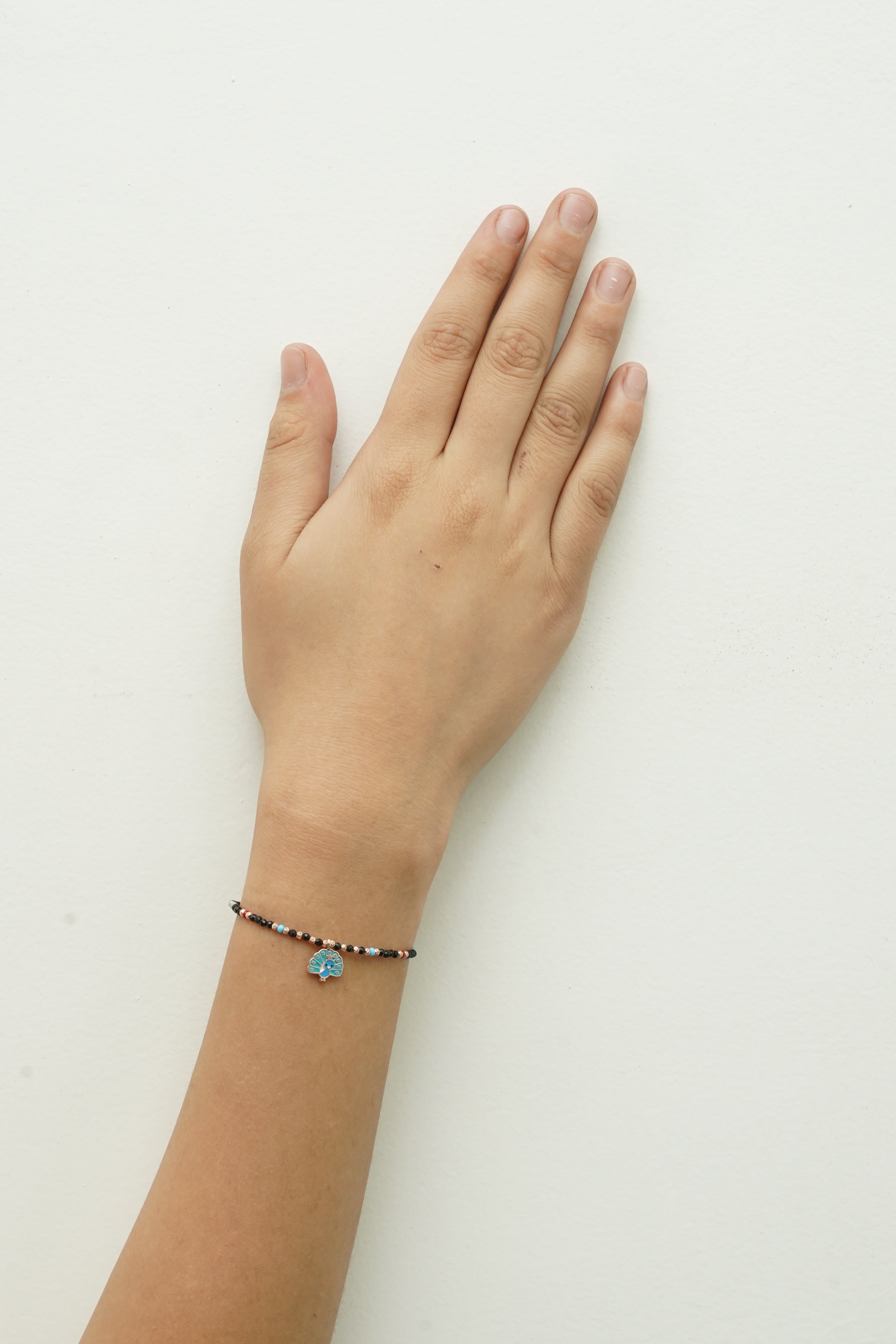 SILVER PEACOCK NAZARIYA