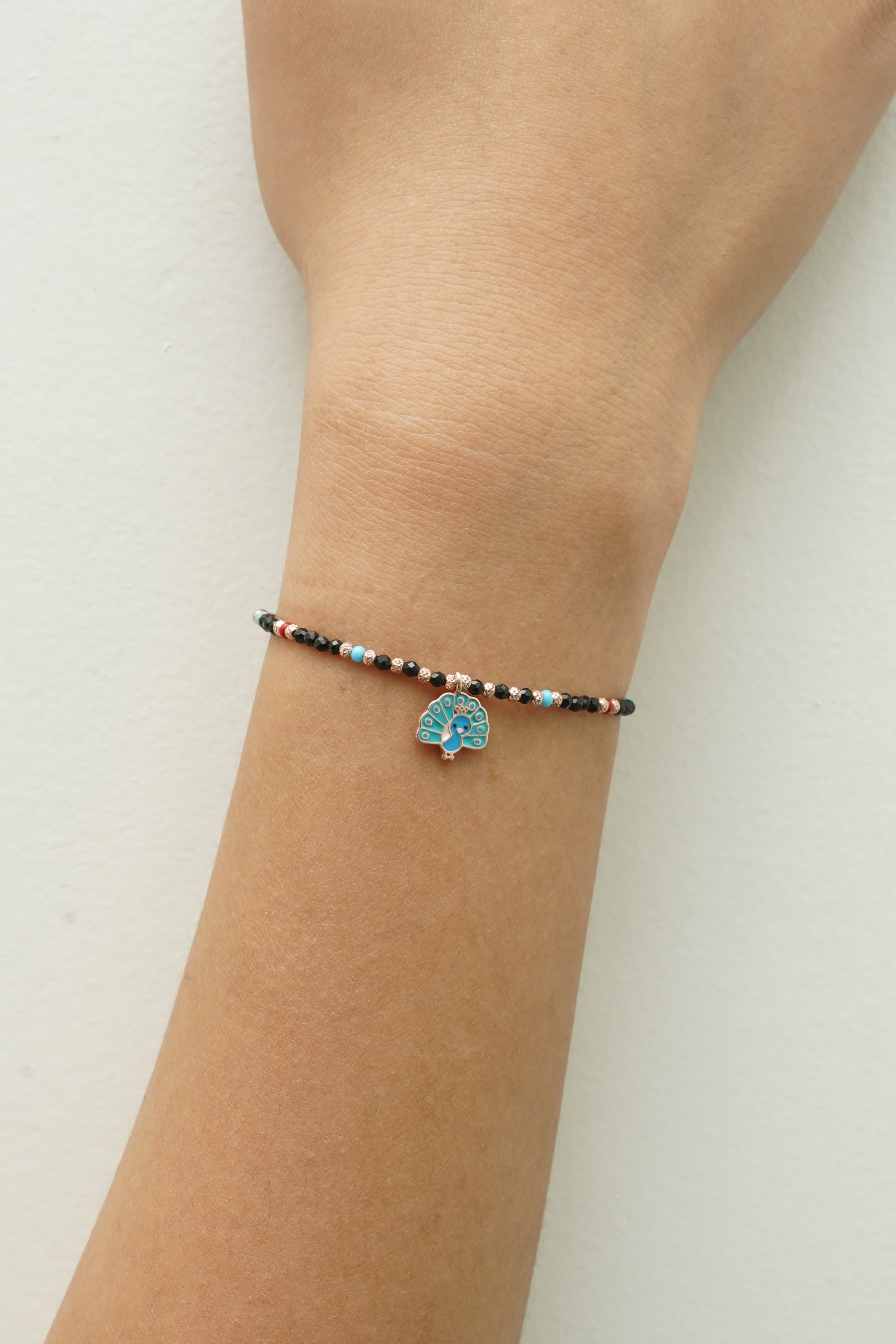 SILVER PEACOCK NAZARIYA